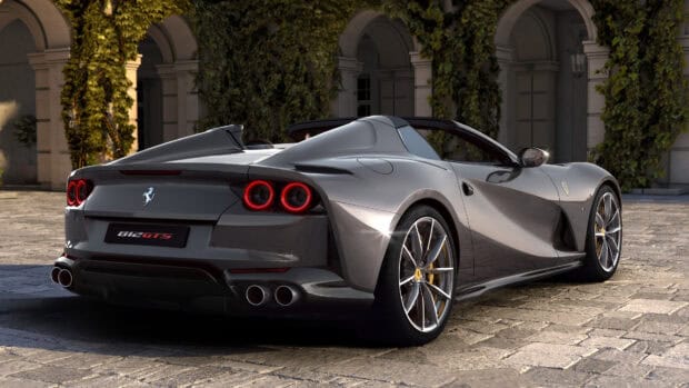 The Ferrari 812 Gts is shown parked in an elegant courtyard with detailed lighting, 4K Desktop Wallpaper