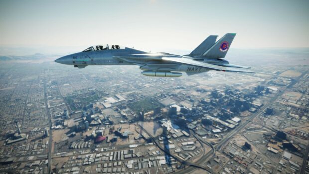 A fighter jet from the Top Gun Maverick flies above a sprawling urban area on a clear day, 2K Desktop Wallpaper