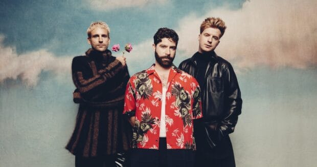 Foals Band group posing against a blue and beige artistic background, HD Desktop Wallpaper