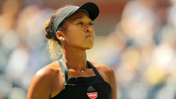 Naomi Osaka looks determined during a match, HD Desktop Wallpaper