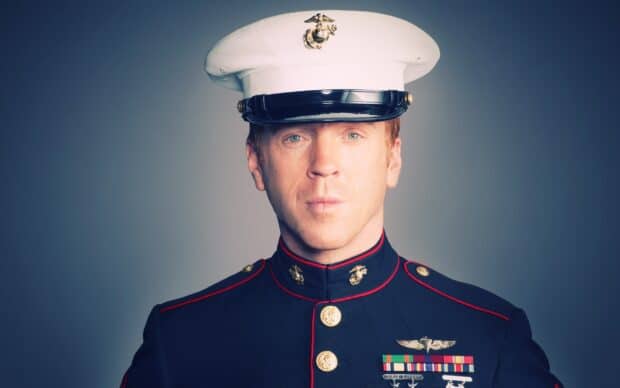 A focused soldier in a decorated uniform symbolizes homeland Wallpapers pride and service, 2K Desktop Wallpaper
