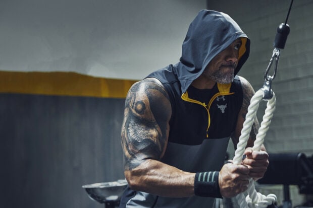 Dwayne Johnson displays strength during an intense gym session, HD Desktop Wallpaper