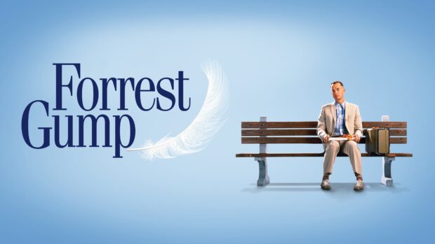 A man sits on a bench next to a suitcase in this Robert Zemeckis wallpaper, 4K Desktop Wallpaper