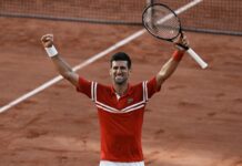 A tennis player celebrates victory on the clay court during the French Open Roland Garros, 2K Desktop Wallpaper