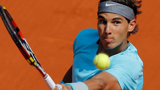 A tennis player concentrating on returning the ball during French Open Roland Garros, 4K Desktop Wallpaper