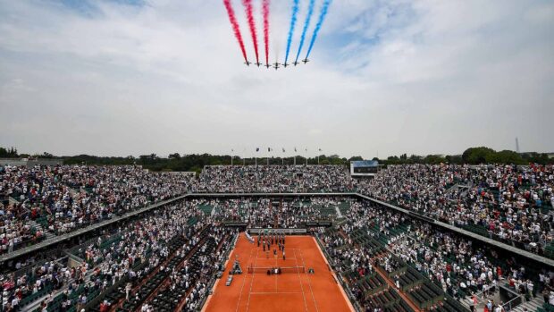 A crowded Roland Garros tennis court with planes flying overhead during an event, HD Desktop Wallpaper