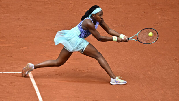 A tennis player competes intensely during the French Open Roland Garros tournament, HD Desktop Wallpaper