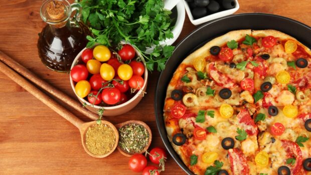 A close up of seasoning with herbs and a vegetable pizza on a wooden table, HD Desktop Wallpaper