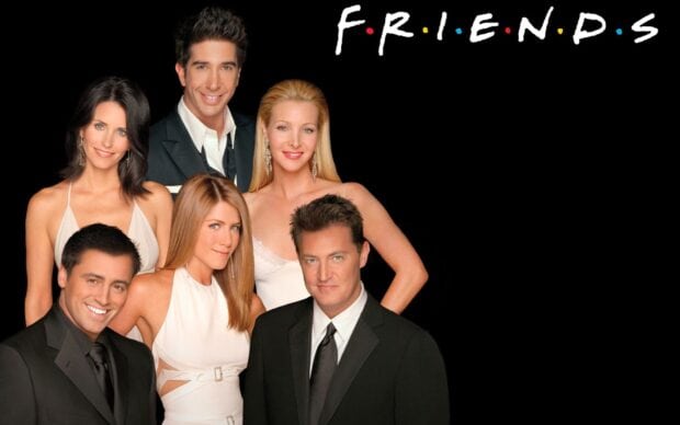 Friends TV show cast posing together in formal wear with Phoebe Buffay, 2K Desktop Wallpaper