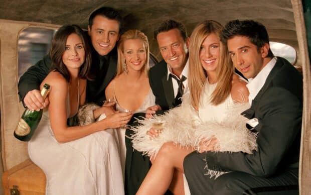 The Friends cast celebrates together in a limousine with drinks and smiles, HD Desktop Wallpaper
