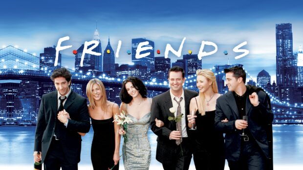 The Friends cast including Phoebe Buffay is walking near a lit up bridge at night, 4K Desktop Wallpaper