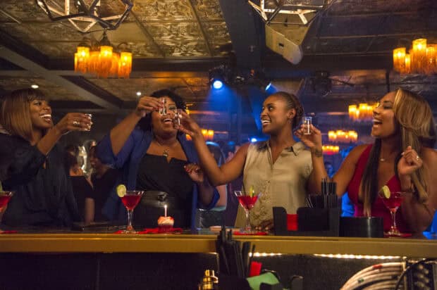 Four women toast with shots at a vibrant party scene from Insecure Tv Series wallpapers, HD Desktop Wallpaper