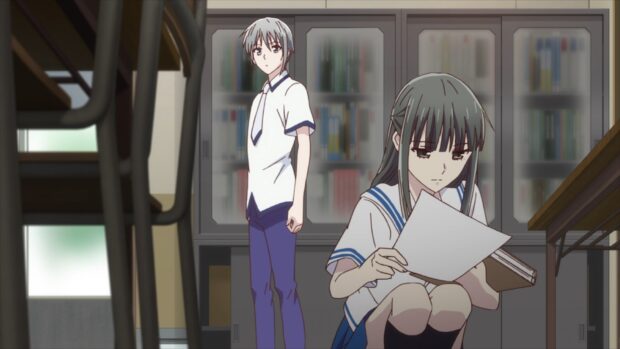 Two Fruits Basket anime characters are seen in a quiet library setting, HD Desktop Wallpaper