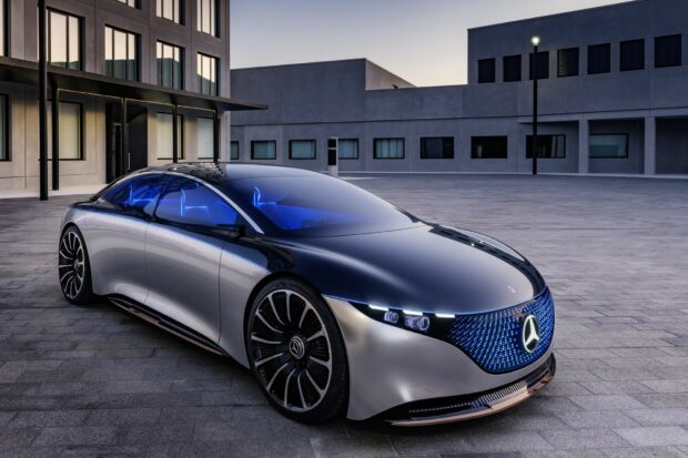 The sleek Mercedes Benz Eqs car is parked in an urban environment with modern buildings, HD Desktop Wallpaper
