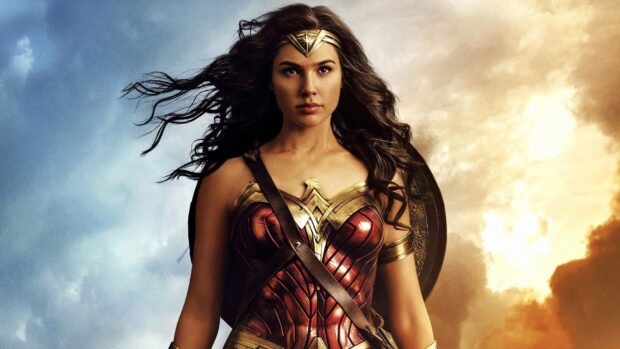 Gal Gadot Wonder Woman stands confidently in her iconic armor against a dramatic sky, HD Desktop Wallpaper