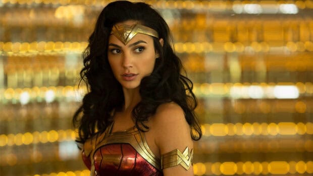 Gal Gadot as Wonder Woman stands confidently with golden armor, 4K Desktop Wallpaper