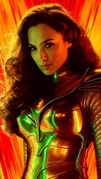 Gal Gadot Wonder Woman Wallpapers features her in reflective golden armor with a vibrant red and orange background, HD Phone Wallpaper