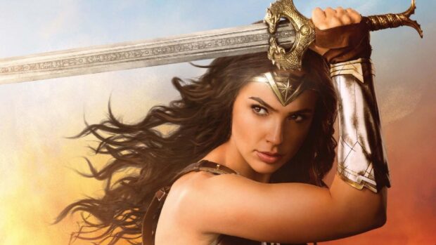 Gal Gadot is holding a sword with determination in this Wonder Woman scene, HD Desktop Wallpaper
