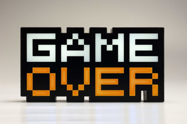 A pixel art sign displays the words game over in white and orange colors, HD Desktop Wallpaper