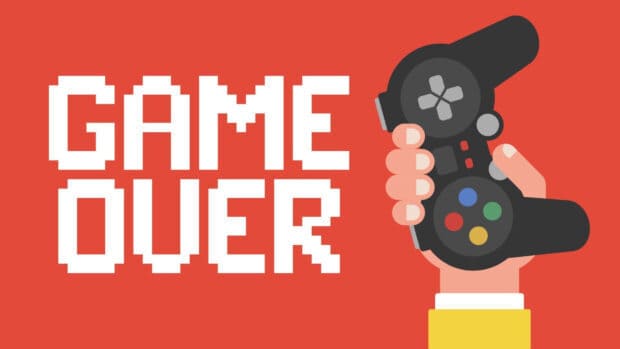 A hand holding a video game controller with a game over message on the red background, HD Desktop Wallpaper