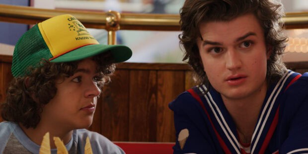 Gaten Matarazzo talks with a friend at a diner, HD Desktop Wallpaper