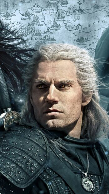 Geralt of Rivia stands in armor with a map background in The Witcher Tv Series, 2K Phone Wallpaper