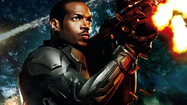 A soldier wearing armor fires a weapon in a forest fight from Gi Joe movie, HD Desktop Wallpaper