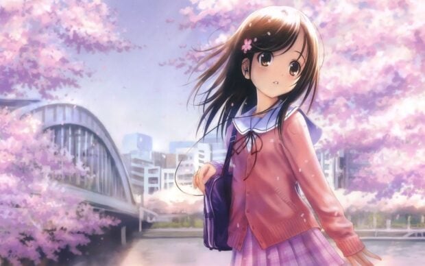 A girl with earphones stands near a bridge surrounded by blooming cherry blossoms in the city, HD Desktop Wallpaper