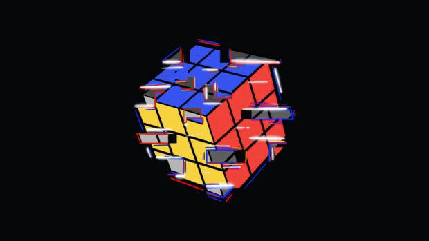 A Rubik's Cube with glitch effect floating against a black background shows cube wallpapers concept, 4K Desktop Wallpaper