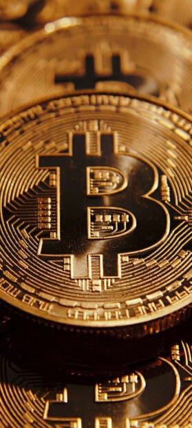 A close up of a golden Bitcoin design showing digital circuits, HD Phone Wallpaper