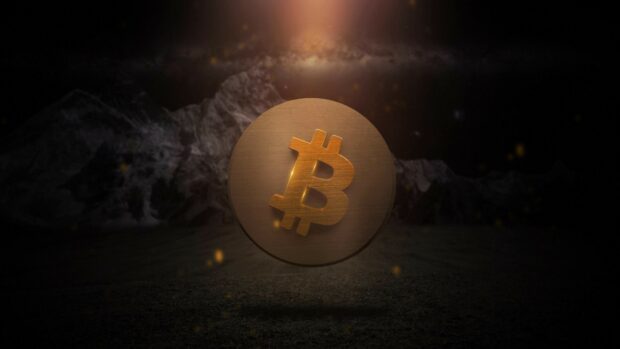 A golden Bitcoin symbol floats in a dark and mysterious landscape with mountains in the background, 4K Desktop Wallpaper