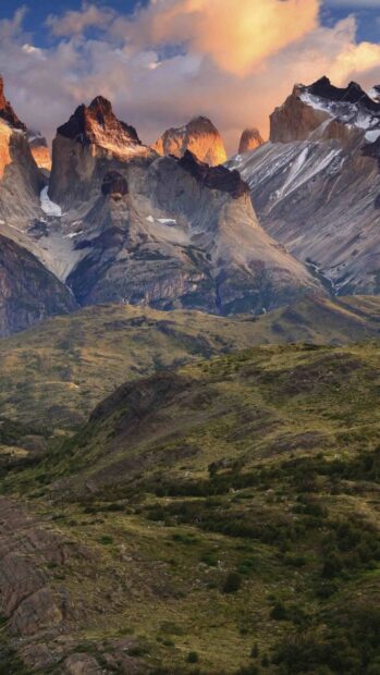 The golden light illuminates the rugged peaks of Torres Del Paine National Park at sunset, HD Phone Wallpaper
