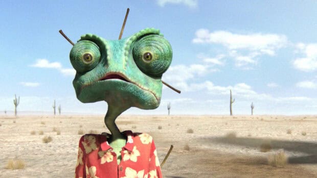 A green animated character from Gore Verbinski stands in a desert landscape, HD Desktop Wallpaper