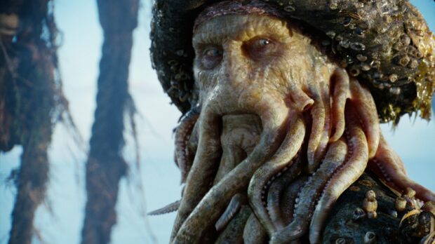 A detailed close up of a Gore Verbinski character with tentacles and barnacles, 2K Desktop Wallpaper