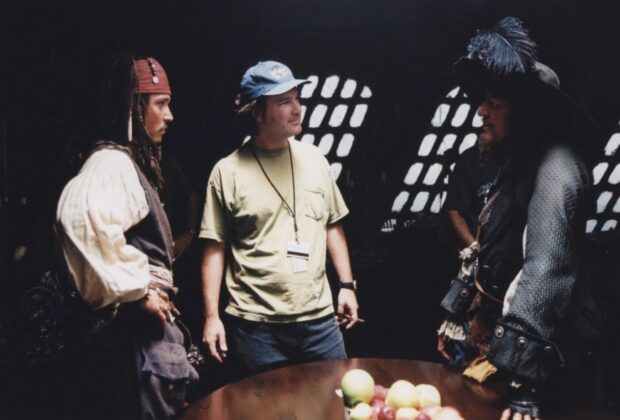 Gore Verbinski is discussing scenes with actors in costume on set, HD Desktop Wallpaper