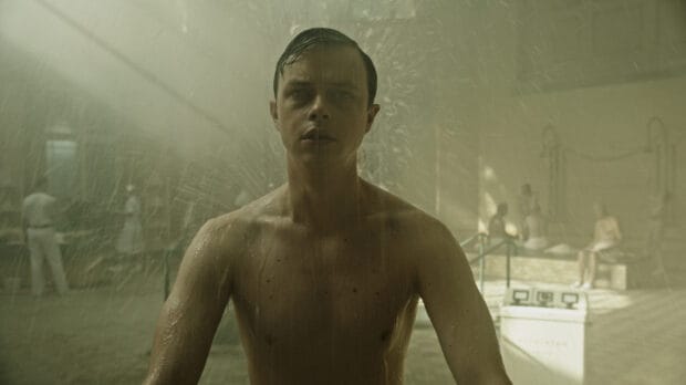 A man stands under running water in a tense moment from Gore Verbinski, 2K Desktop Wallpaper