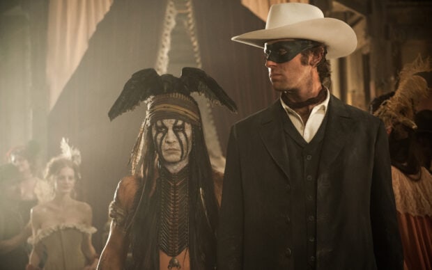 The man in a mask and the painted character stand in a vintage room, 2K Desktop Wallpaper