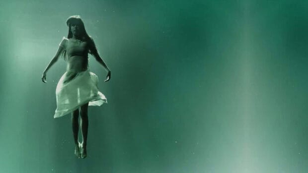 A woman floats in a green misty atmosphere in this Gore Verbinski artwork, 4K Desktop Wallpaper