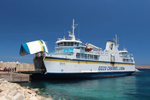 A ferry from the Gozo Channel Line is docked with people boarding, HD Desktop Wallpaper