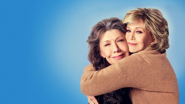 The cast of Grace And Frankie Netflix is shown warmly hugging on a blue background, HD Desktop Wallpaper