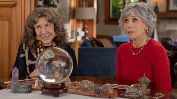Grace and Frankie are seated near a crystal ball having a conversation, HD Desktop Wallpaper