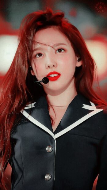 Nayeon Wallpapers showing a close up of her intense stage expression, HD Phone Wallpaper