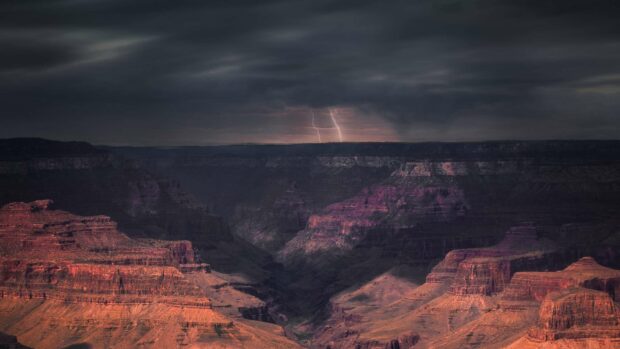 The Grand Canyon shows dramatic lightning under dark clouds, HD Desktop Wallpaper