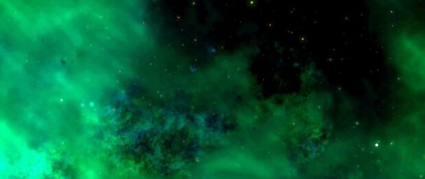 A stunning green nebula spreads across the dark space with scattered stars visible, 2K Desktop Wallpaper