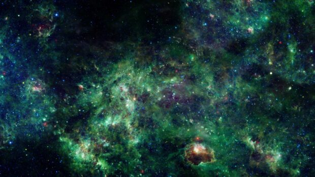 A vibrant green nebula displays glowing gas and stars in deep space, 4K Desktop Wallpaper