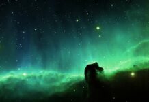The green nebula shows glowing gas and stars in vast space, 4K Desktop Wallpaper