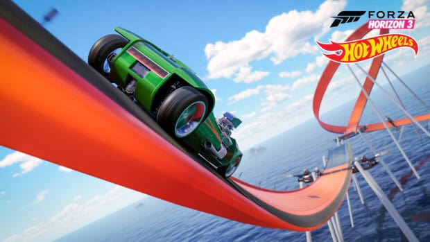A green race car is racing fast on a curved orange Hot Wheels track above the ocean, 4K Desktop Wallpaper