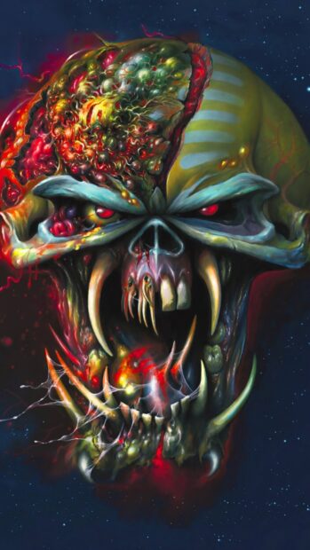 A grotesque skull with sharp teeth and glowing red eyes is shown in this Iron Maiden Band Wallpapers artwork, HD Phone Wallpaper