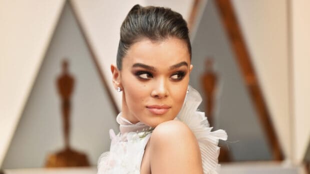 Hailee Steinfeld looks over her shoulder in a detailed white dress, HD Desktop Wallpaper