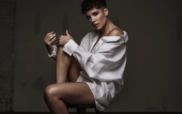 Halsey wallpapers show her sitting on a stool wearing a loose white shirt, 2K Desktop Wallpaper